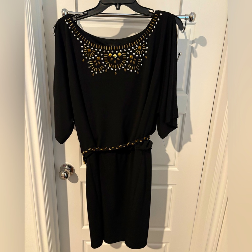 Black cocktail dress with jeweled neck and belt